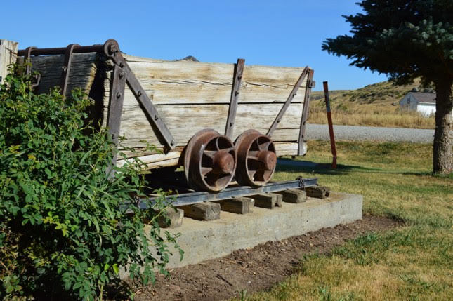 Picture of an old wooden mining cart.